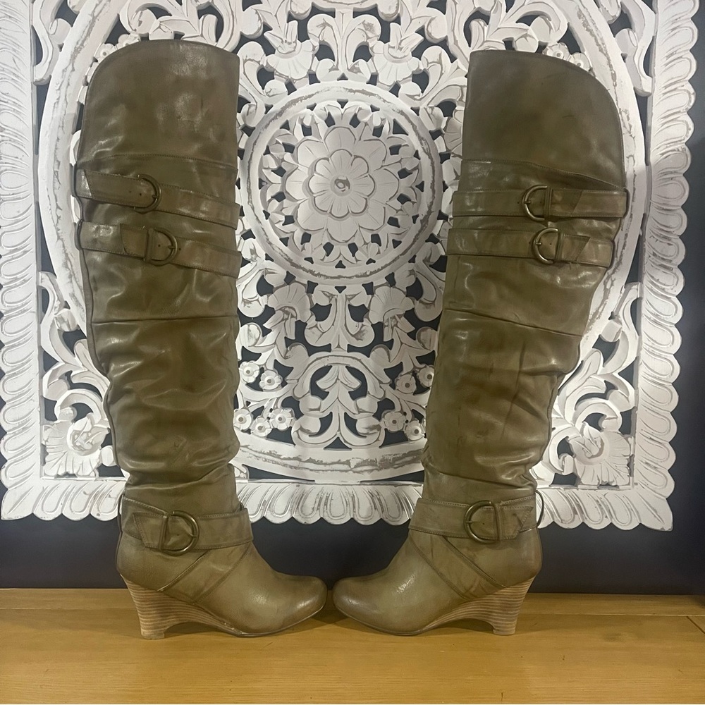 Not rated, tan, over the knee boots, women’s size 9.5, worn only twice